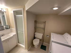 3/4 Bathroom with nice rack over toilet