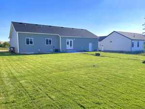 Rear view of house faces North.  .29 acres lot with plenty of space between houses on the sides.