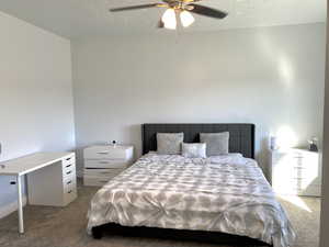 Bedroom featuring carpet floors and a ceiling fan