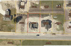Aerial overview of property's location featuring property parcel outlined