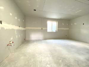 This can be a bedroom but it's now stubbed for a second kitchen with H/C and a drain.