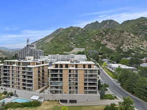 Drone / aerial view of mountains and apartment complex