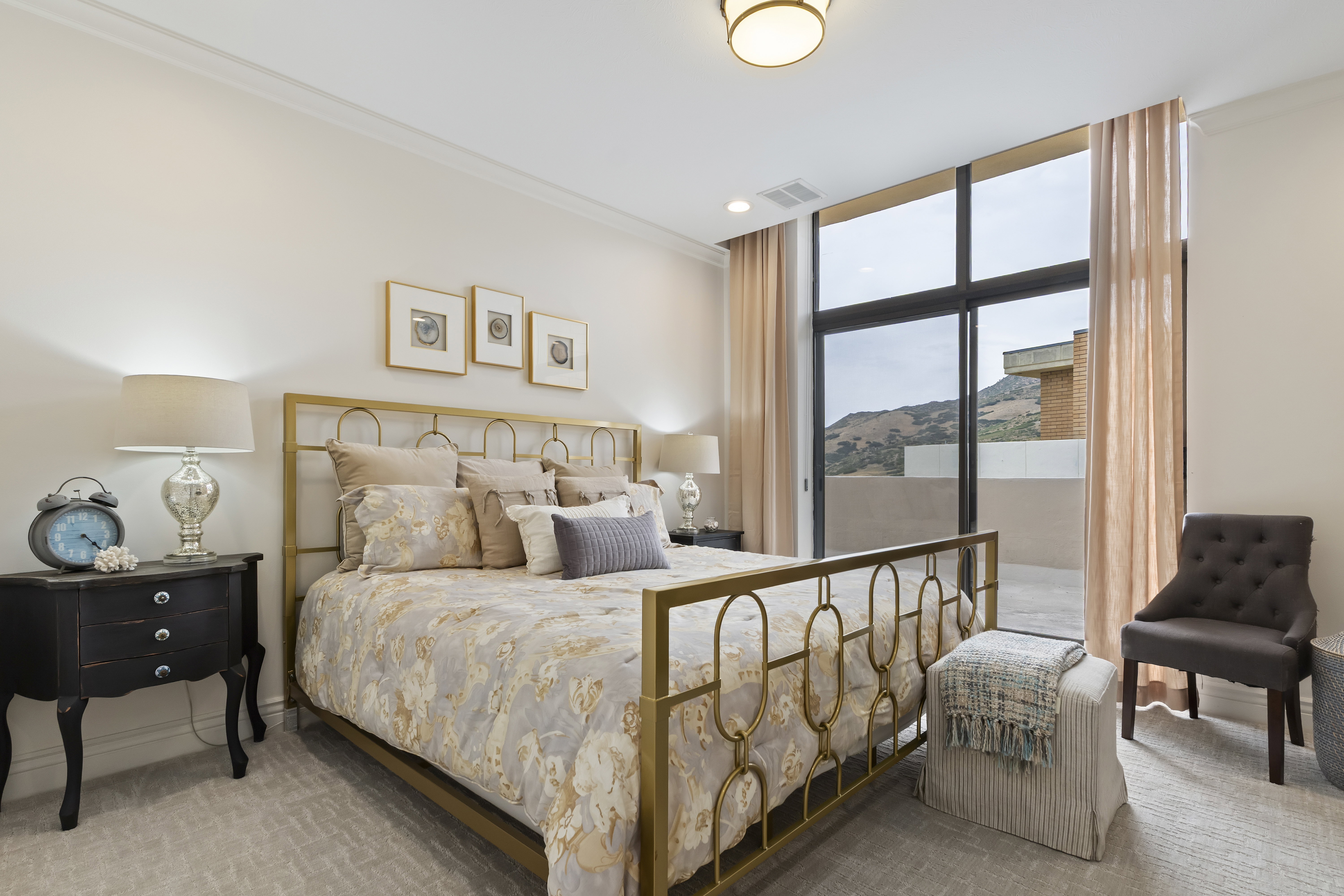 Bedroom featuring expansive windows, carpet flooring, recessed lighting, and access to exterior