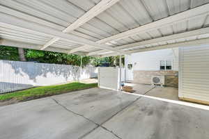 View of carport and patio