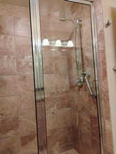 Bathroom with a stall shower