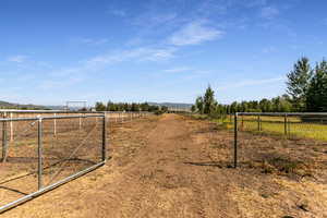 View of yard with a view of countryside and a mountain view