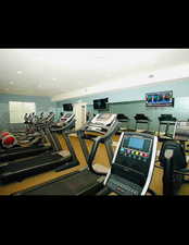 Workout area featuring recessed lighting