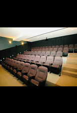 Home theater room with recessed lighting