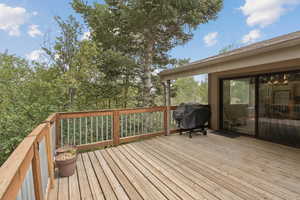 Deck featuring a grill