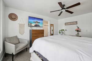 Bedroom featuring carpet flooring and ceiling fan