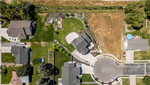 View of property location with nearby suburban area