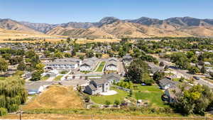 Aerial perspective of suburban area featuring mountains