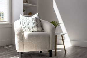 Sitting room with wood finished floors