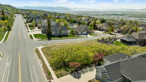 Aerial view of residential area featuring a mountain backdrop