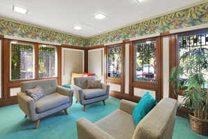 Community lobby featuring wallpapered walls