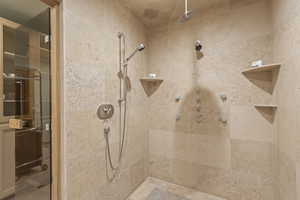 Bathroom with tiled shower