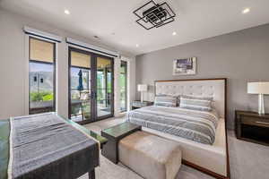 Bedroom featuring french doors, carpet, access to exterior, and recessed lighting
