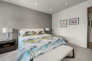 Bedroom featuring carpet and recessed lighting