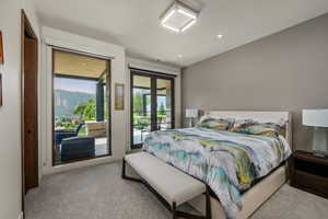 Bedroom featuring carpet flooring, access to outside, recessed lighting, and french doors