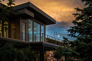 View of home's exterior featuring a balcony