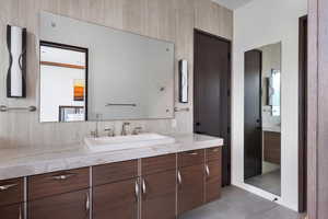 Bathroom with vanity and tile patterned flooring