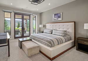 Bedroom with french doors, access to exterior, carpet floors, recessed lighting, and a mountain view