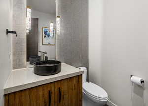 Bathroom with toilet and vanity