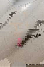 Bathroom with tiled shower