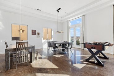 Dining room with finished concrete flooring
