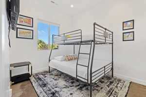 Bedroom with baseboards and recessed lighting