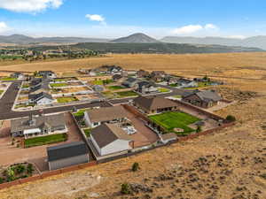 Aerial view of residential area featuring mountains