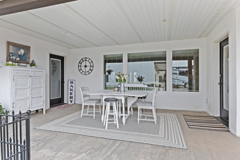 Dining space featuring light colored carpet