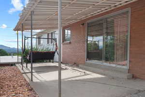 View of patio / terrace featuring a mountain view