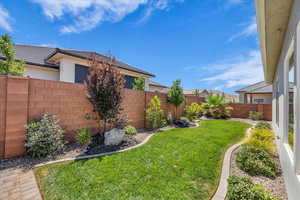 View of fenced backyard