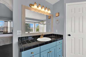 Full bathroom with vanity