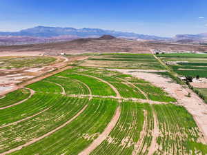 Aerial view of sparsely populated area featuring a mountainous background