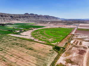 View of mountain backdrop featuring rural landscape and abundant farmland