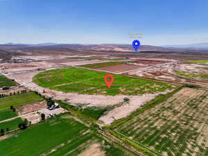 Aerial view of sparsely populated area featuring a mountain backdrop