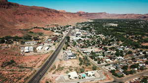 Aerial view of property and surrounding area featuring Red Rocks, aerial view proximity to Hwy 191.