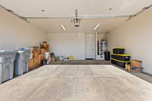 Garage with strapped water heater
