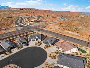 Aerial view of residential area featuring a mountain backdrop