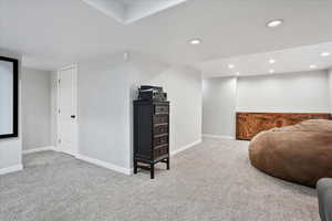 Sitting room featuring recessed lighting and carpet