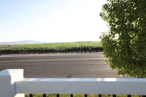 Water view featuring farmland and rural landscape