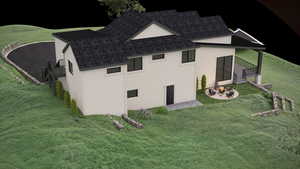 Rear side view of house with a yard and fire place.