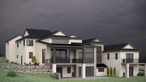 View of back of house with a front lawn, a patio, roof with shingles, and a sunroom