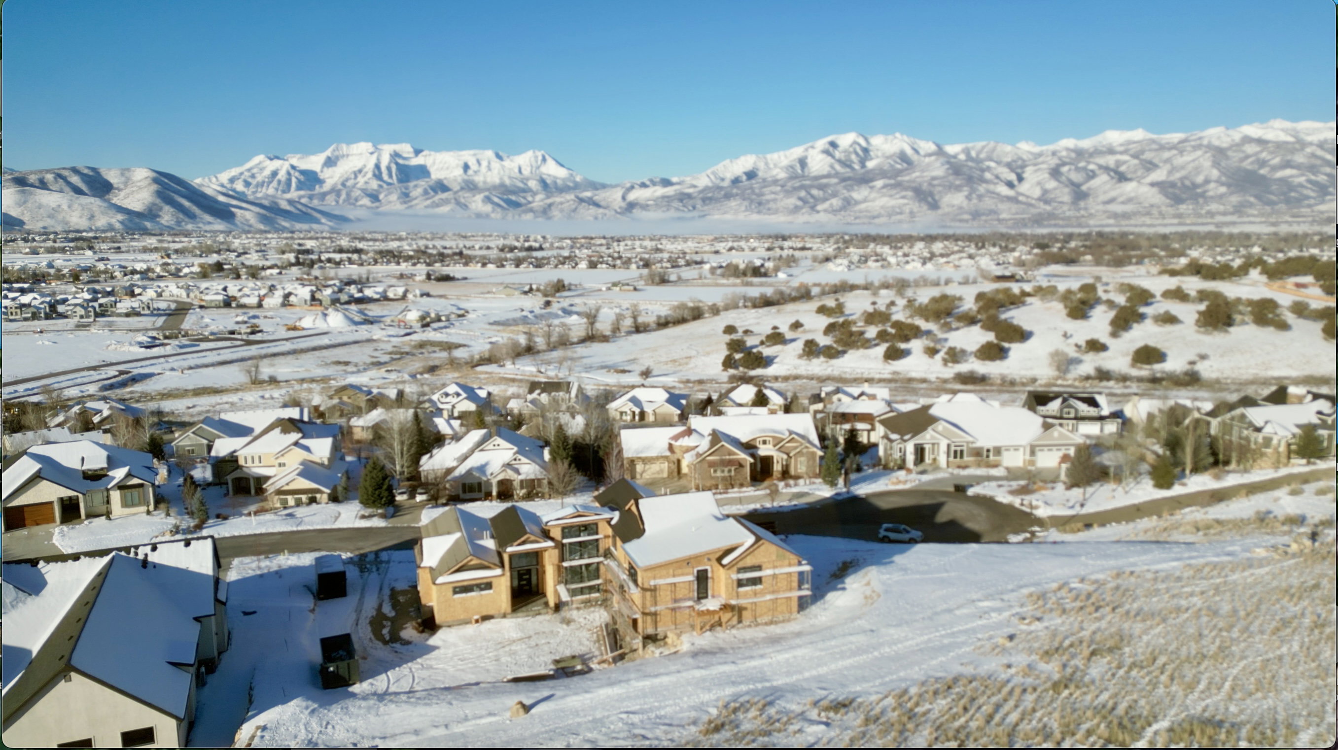 View of mountain background featuring nearby suburban area