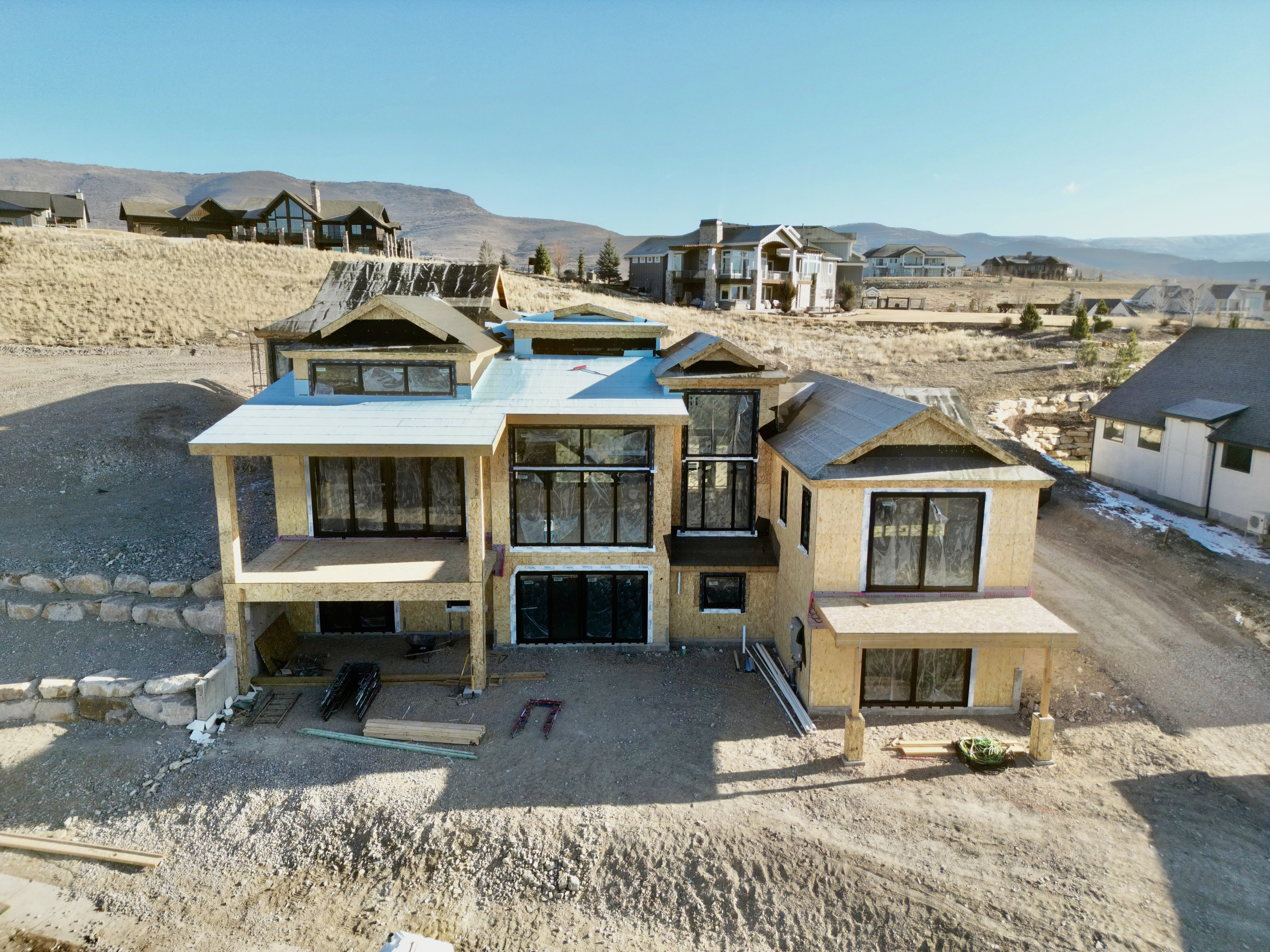 View of back of home facing unobstructed views of Mt. Timpanogos