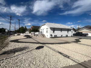 View of asphalt road with traffic signs