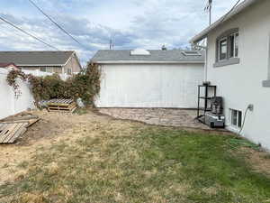 View of yard featuring a patio