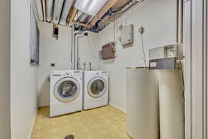 Washroom featuring separate washer and dryer
